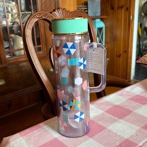 Slant double walled beverage bottle. Cute design with handle. 20oz